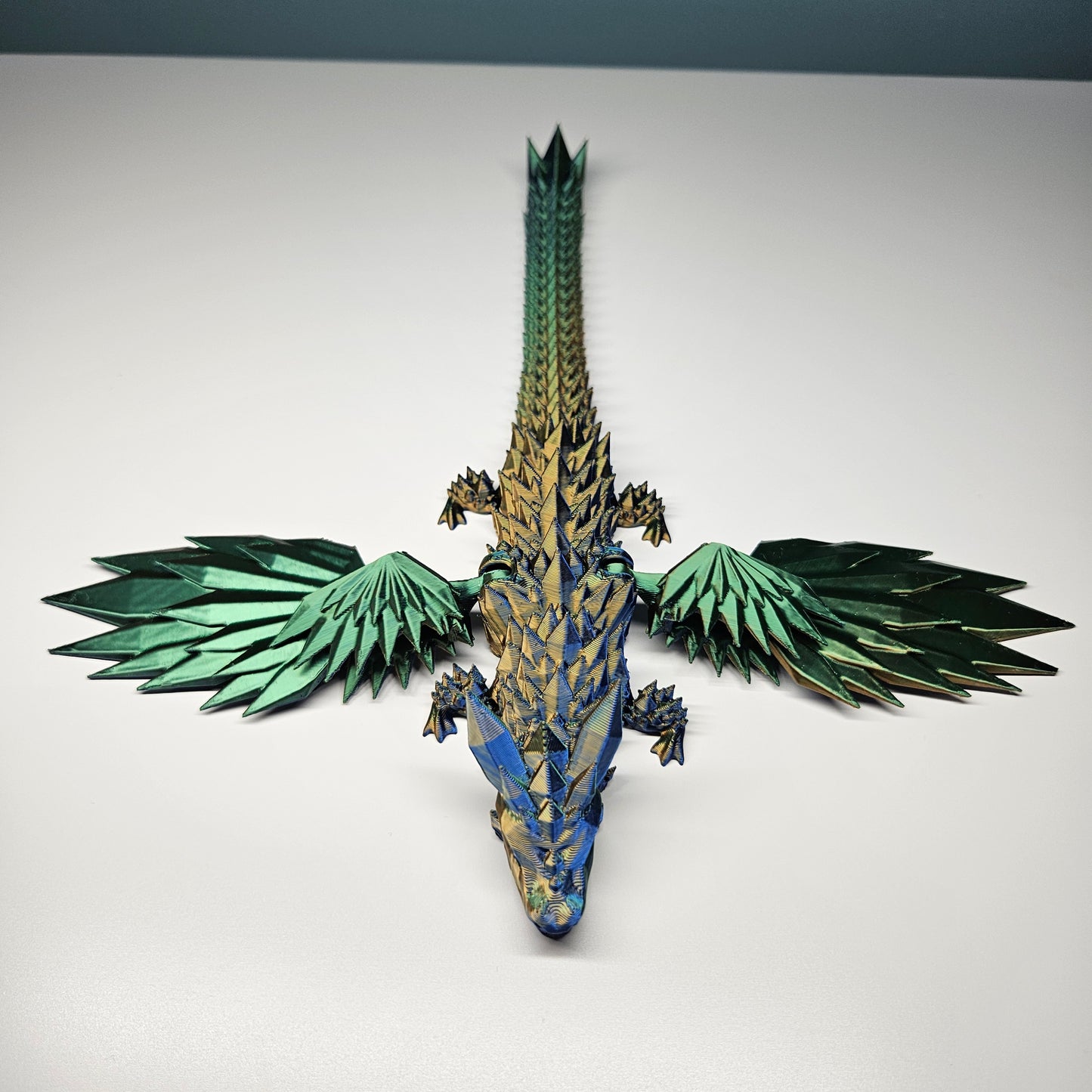 25cm 3D Printed Winged Articulated Dragon - In Gold, Blue & Green. Flexymals.co.uk