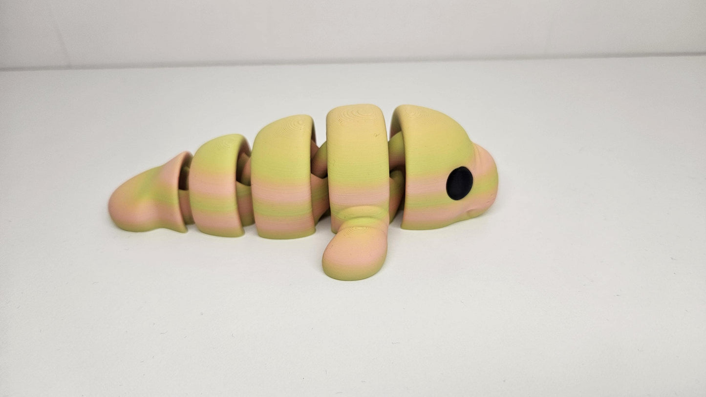 Medium Sized Flexible Manatee in Yellow and Orange. Articulated Fidget Animal