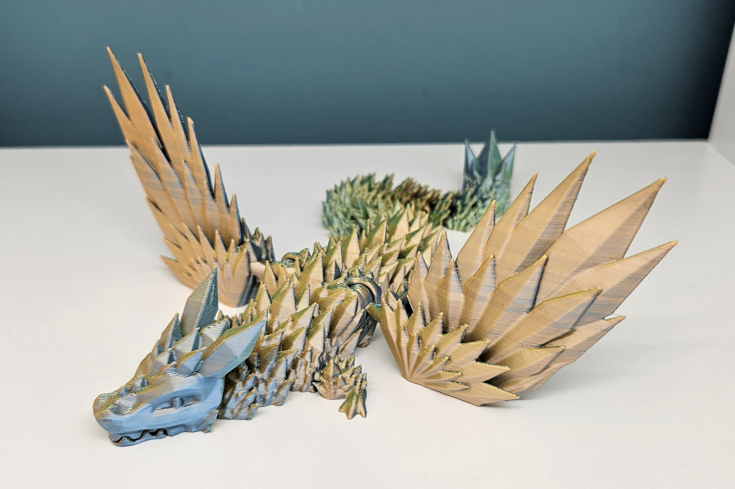 25cm 3D Printed Winged Articulated Dragon - In Gold, Green & Orange by Flexymals.co.uk