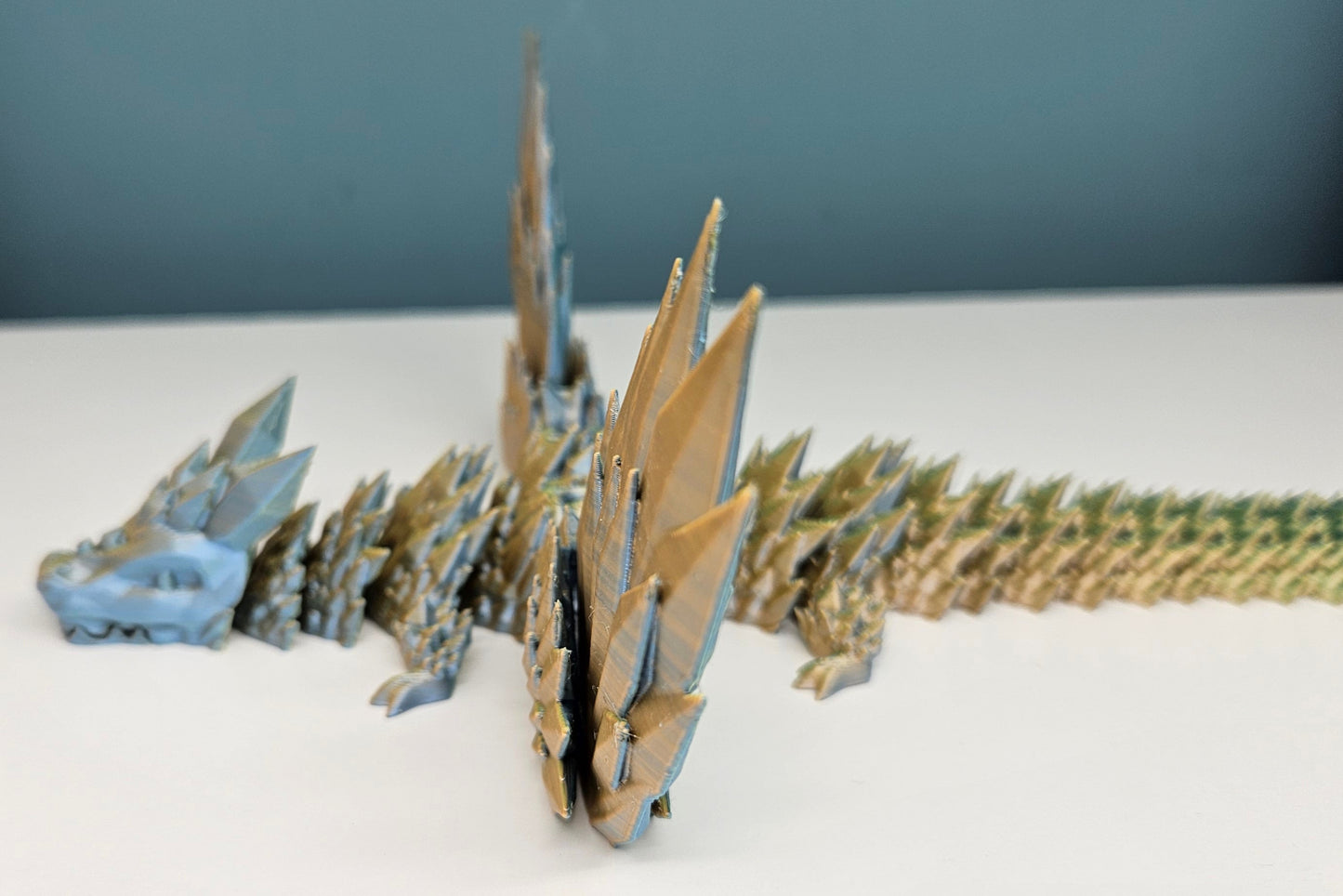 25cm 3D Printed Winged Articulated Dragon - In Gold, Green & Orange by Flexymals.co.uk