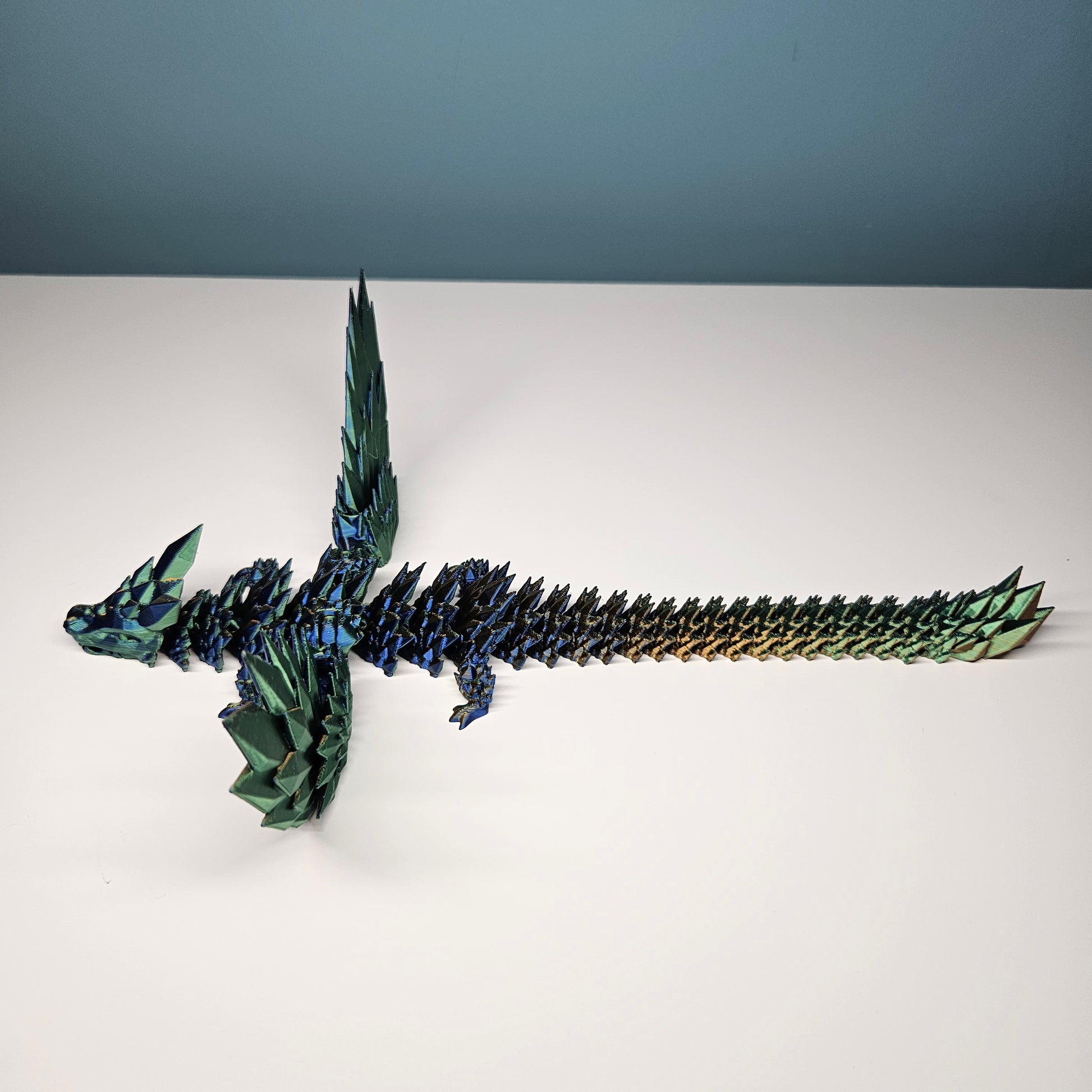 25cm 3D Printed Winged Articulated Dragon - In Gold, Blue & Green. Flexymals.co.uk