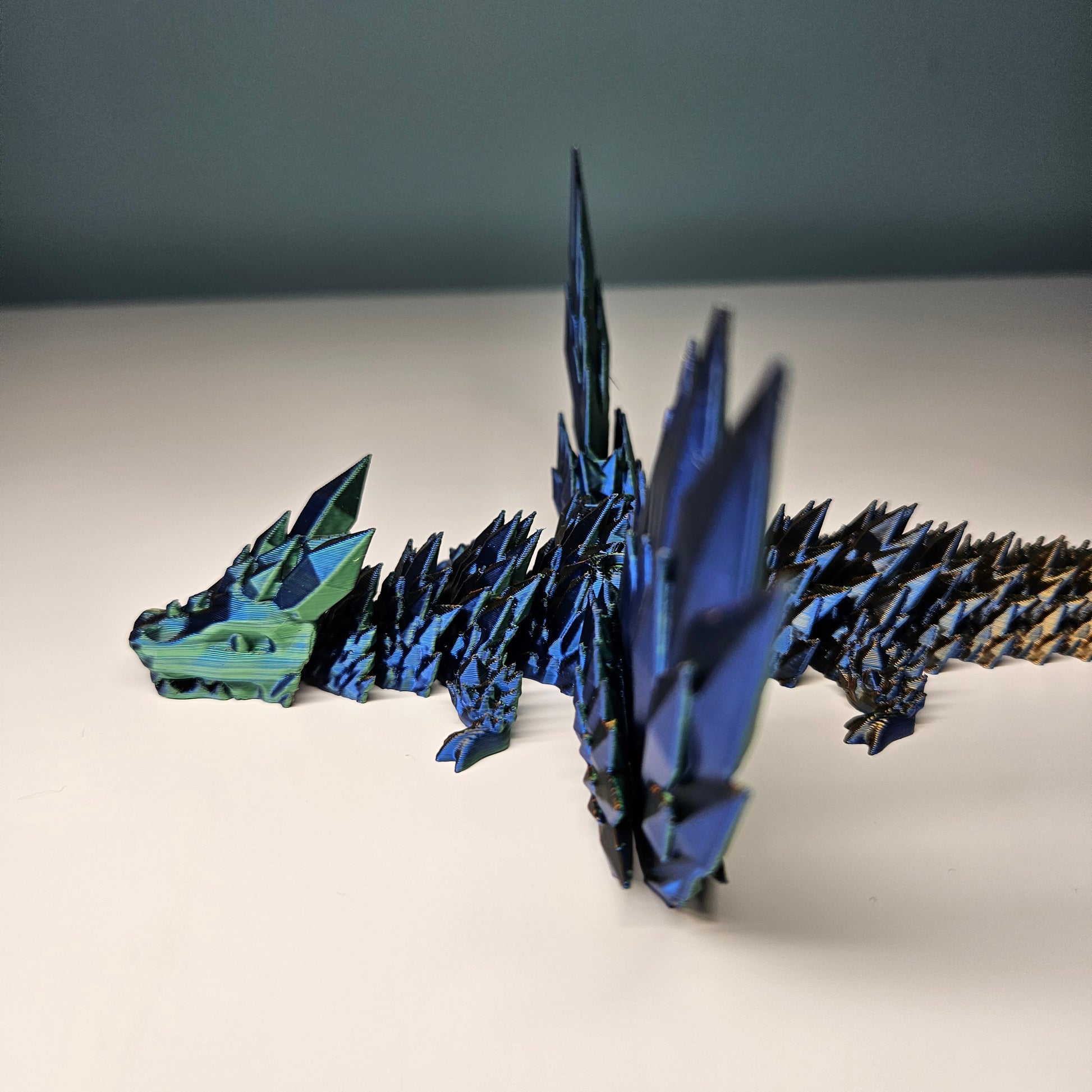 25cm 3D Printed Winged Articulated Dragon - In Gold, Blue & Green. Flexymals.co.uk