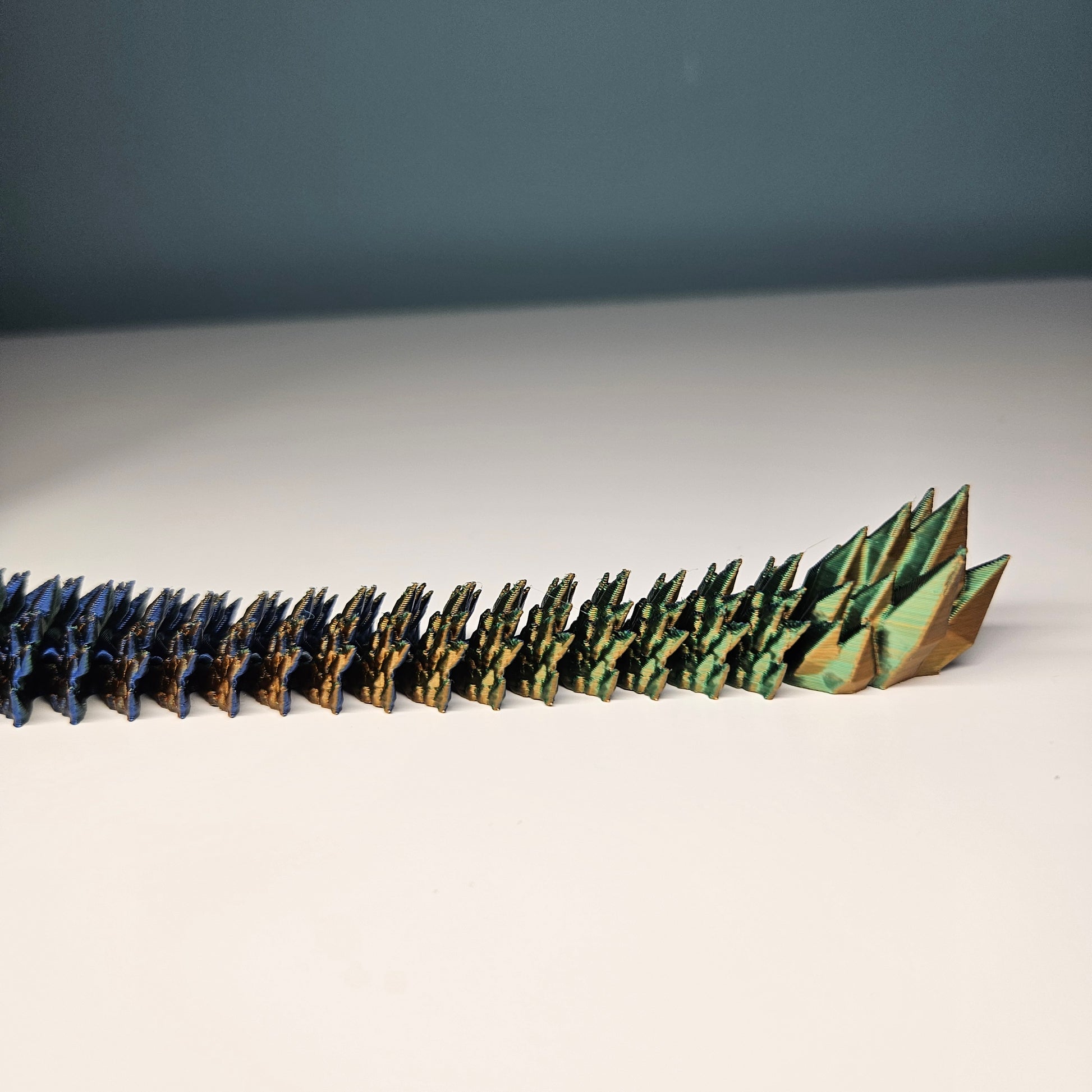 25cm 3D Printed Winged Articulated Dragon - In Gold, Blue & Green. Flexymals.co.uk
