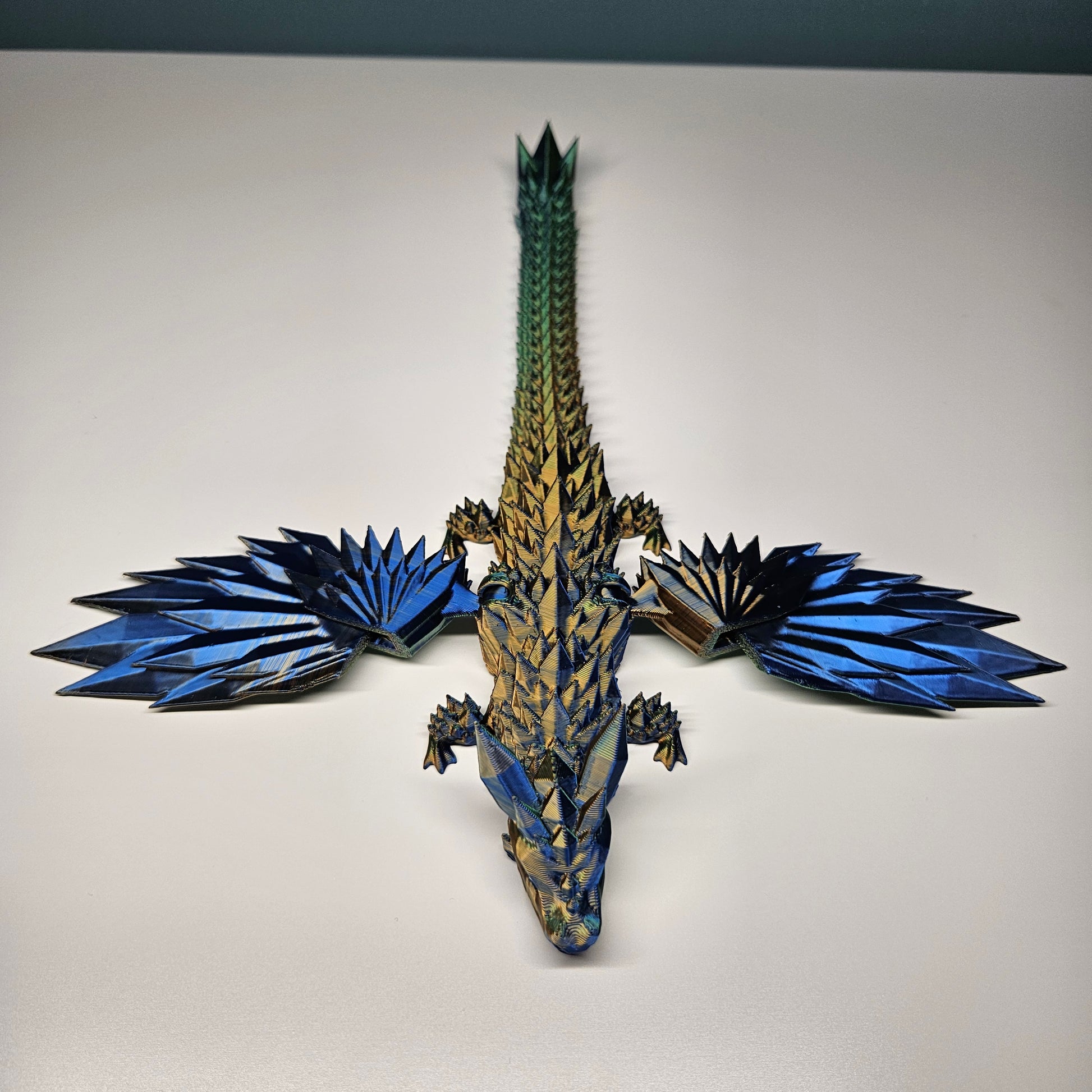 25cm 3D Printed Winged Articulated Dragon - In Gold, Blue & Green. Flexymals.co.uk
