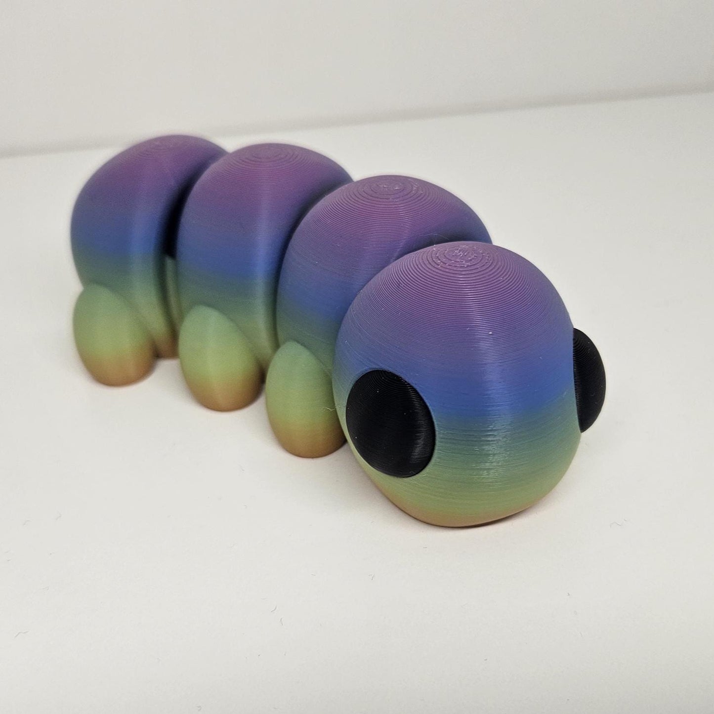 Medium Sized Flexible Caterpillar in Rainbow Colours. Articulated Fidget Animal