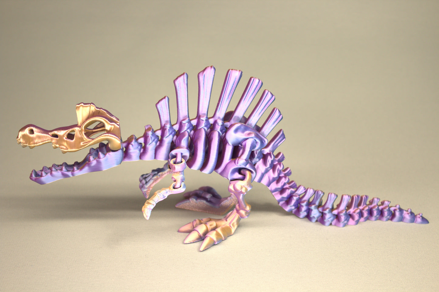 3D printed articulated Spinosaurus skeleton toy, pre-assembled, colorful, educational dinosaur figure