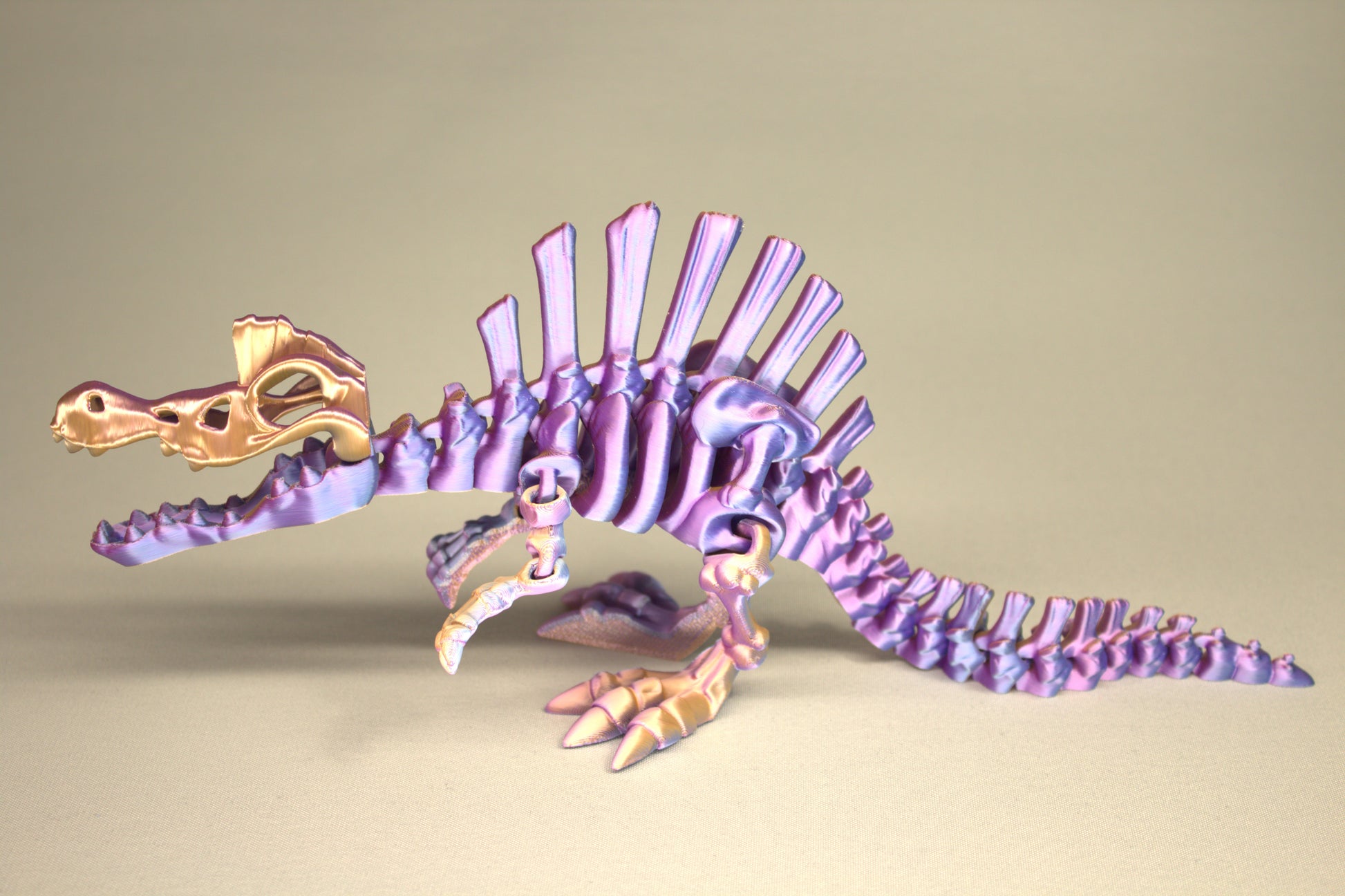 3D printed articulated Spinosaurus skeleton toy, pre-assembled, colorful, educational dinosaur figure