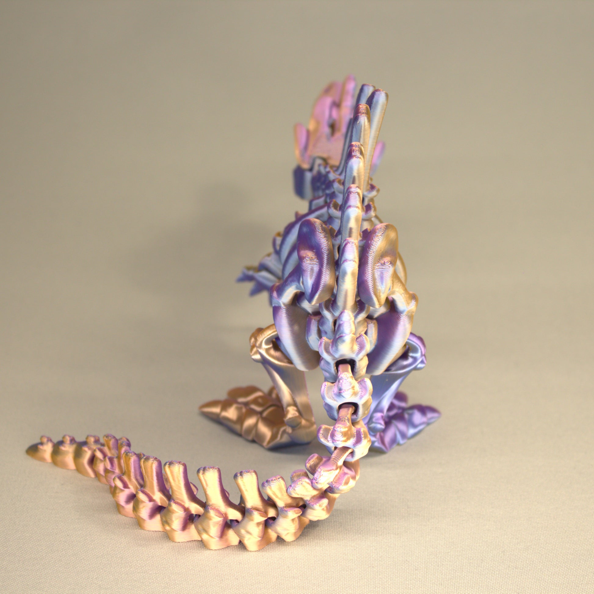 3D printed articulated Spinosaurus skeleton toy, pre-assembled, colorful, educational dinosaur figure