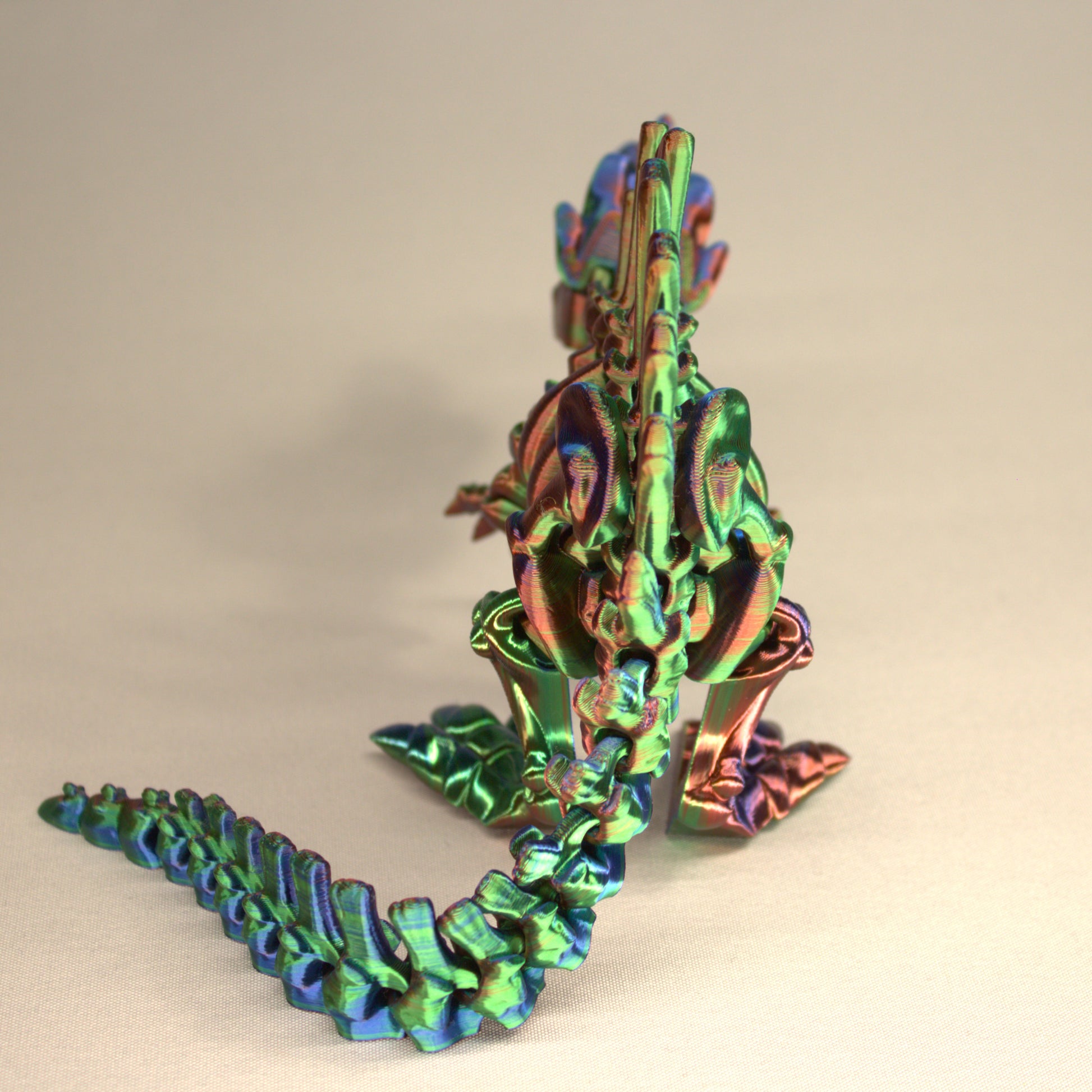 3D printed articulated Spinosaurus skeleton toy, pre-assembled, colorful, educational dinosaur figure