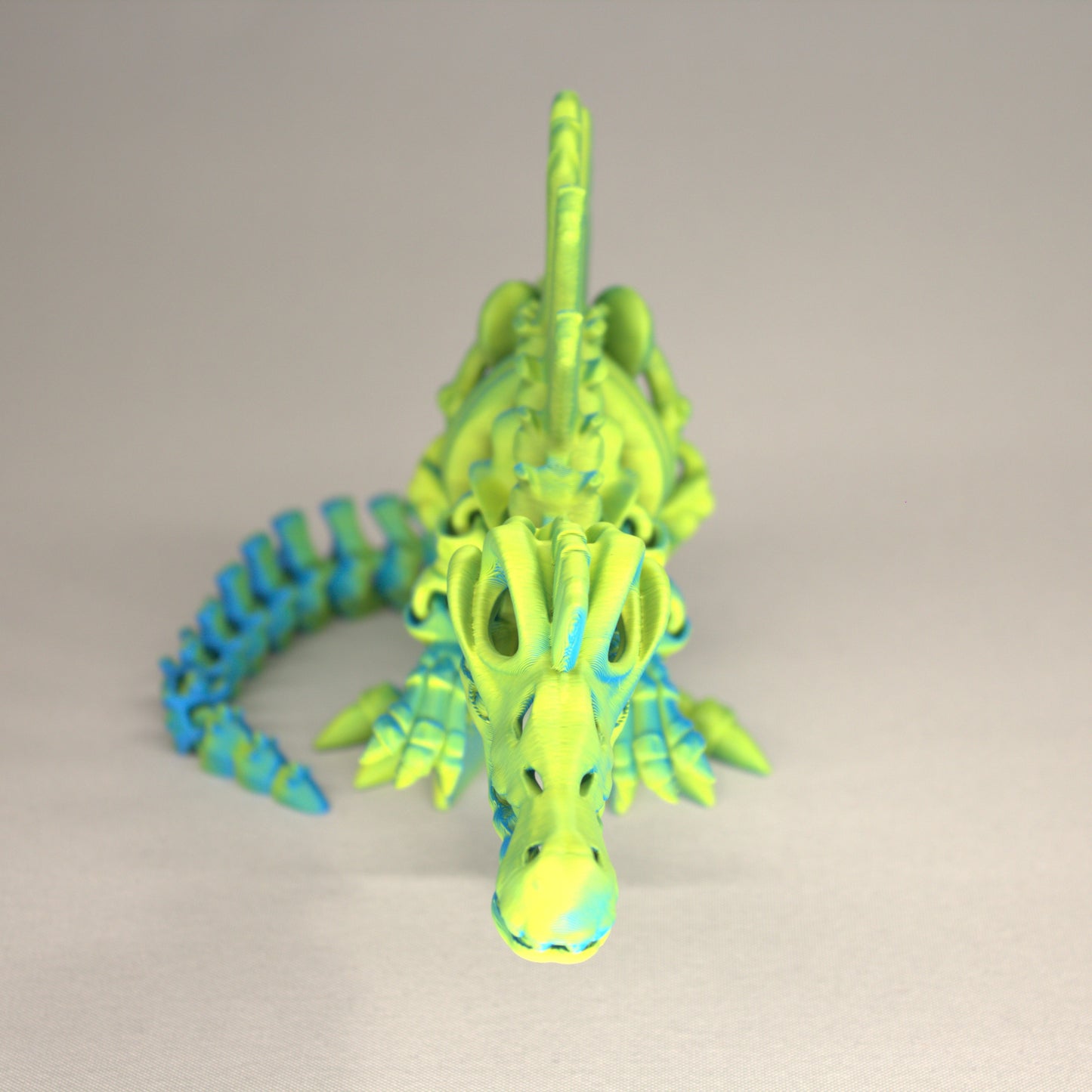 3D printed articulated Spinosaurus skeleton toy, pre-assembled, colorful, educational dinosaur figure