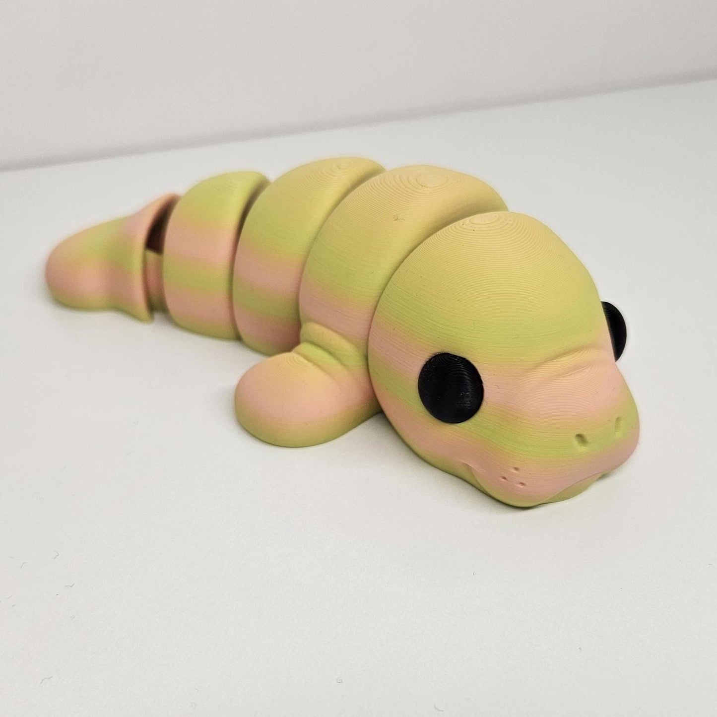 Medium Sized Flexible Manatee in Yellow and Orange. Articulated Fidget Animal