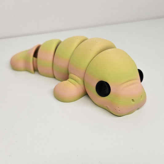 Medium Sized Flexible Manatee in Yellow and Orange. Articulated Fidget Animal
